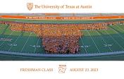 Class of 2027 students stand together in the shape of a longhorn on the football field